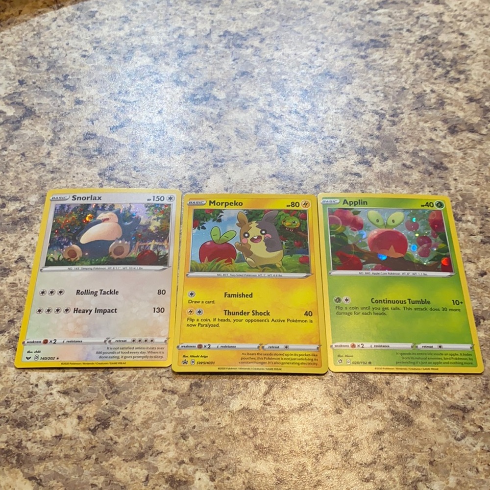 Three Pokémon Cards
